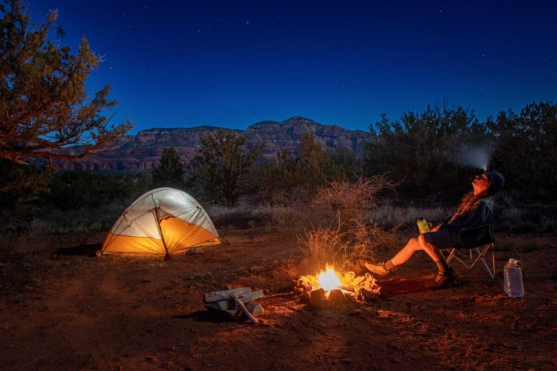 Dispersed camping, also known as free camping or colloquially as boondocking, involves camping for free on public lands, such as national forest or BLM land.