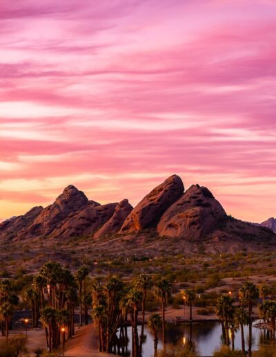 A pink sunset over buttes in Papago Park