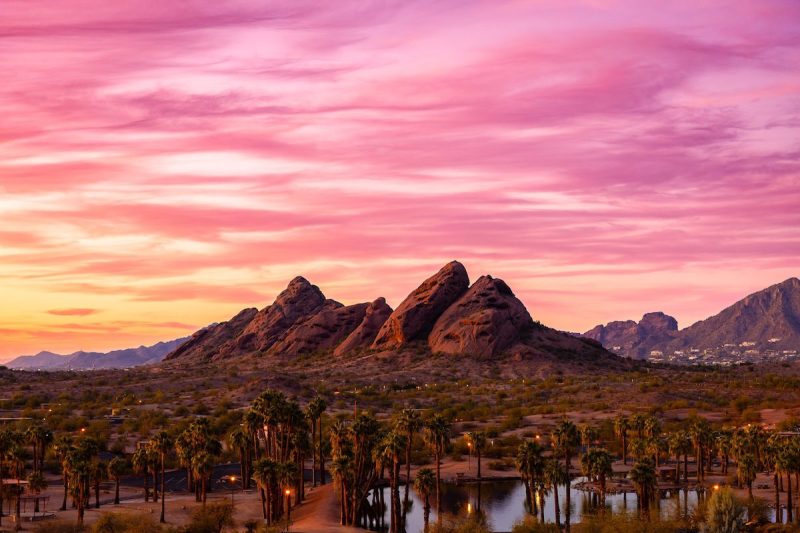 A pink sunset over buttes in Papago Park