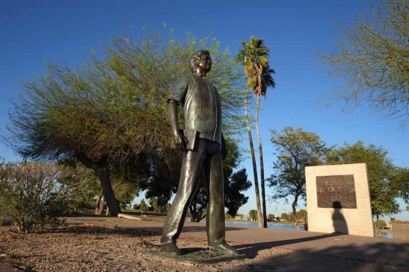 a statue of a man in a park
