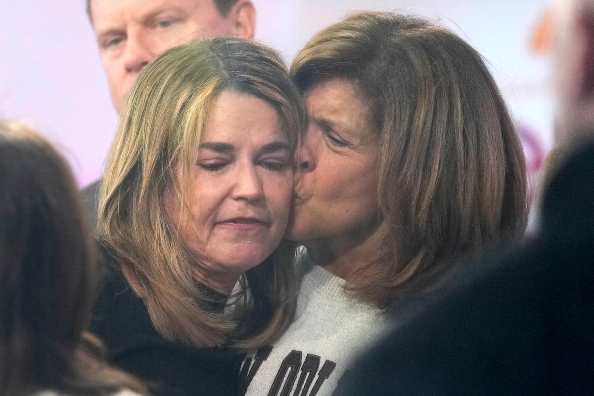 Hoda Kotb kisses Savannah Guthrie on the cheek