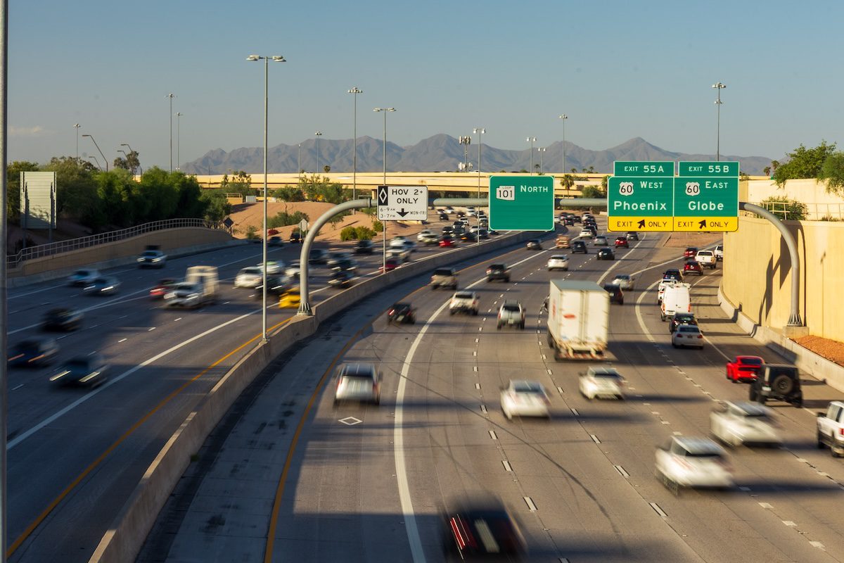 overhead view of both directions of traffic on loop 101 with right hand exits for 60 west Phoenix and 60 east Globe