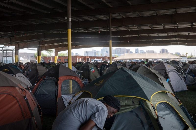 many rows of tents outside under a roof