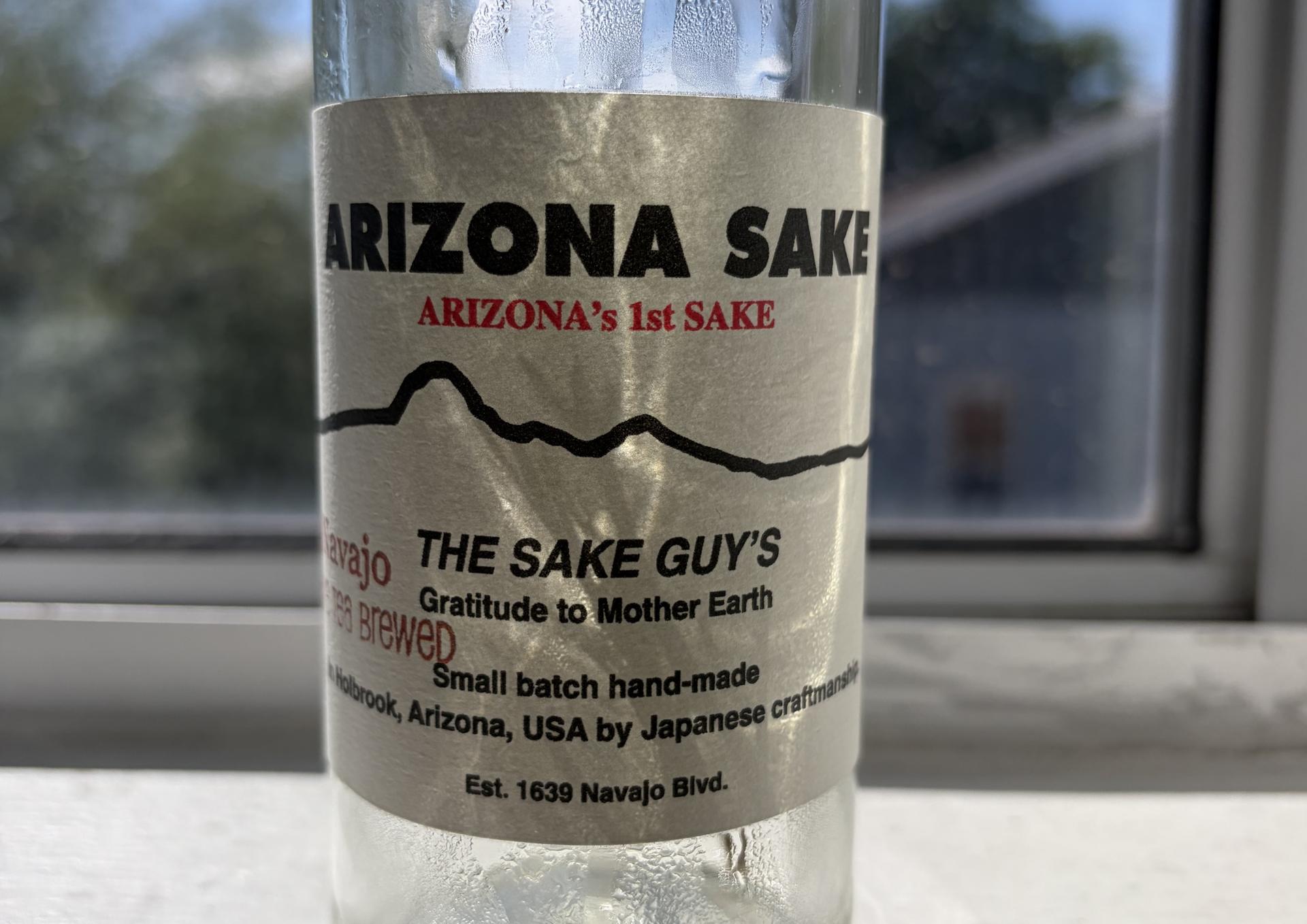glass bottle with a label that says Arizona Sake